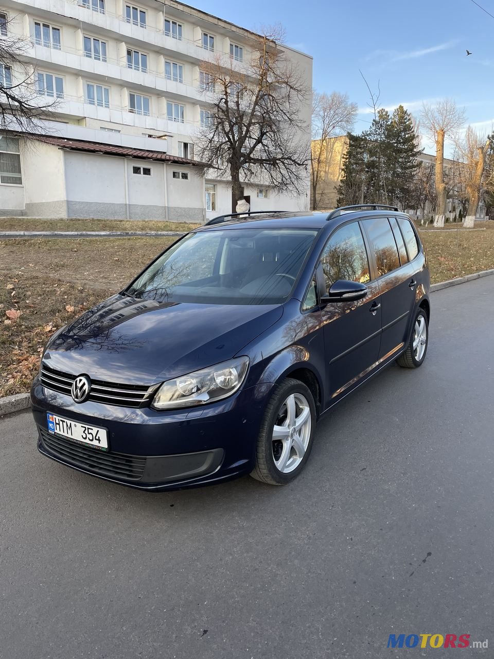 2014' Volkswagen Touran photo #1