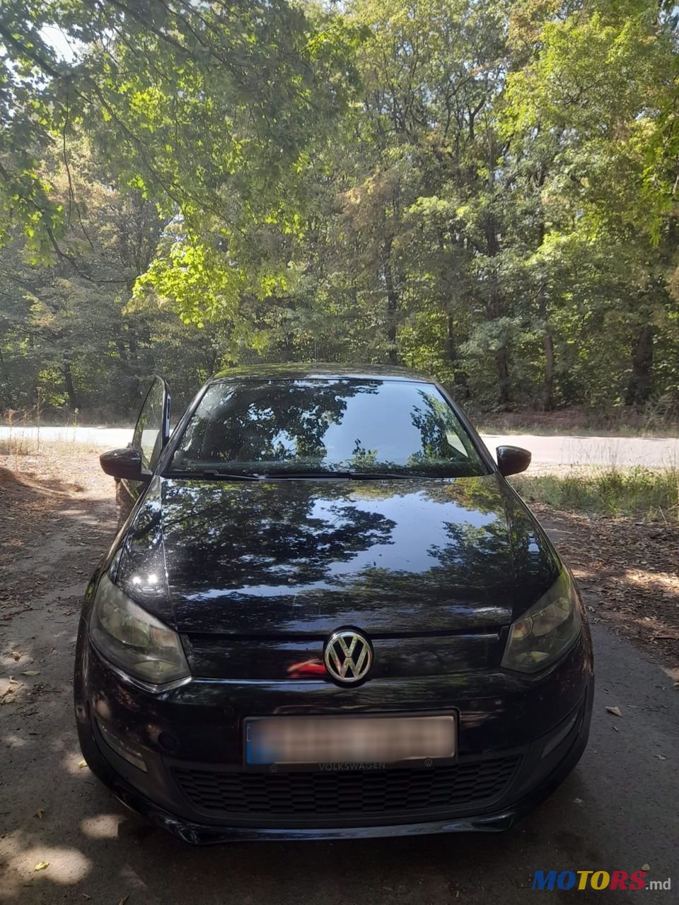 2012' Volkswagen Polo photo #1