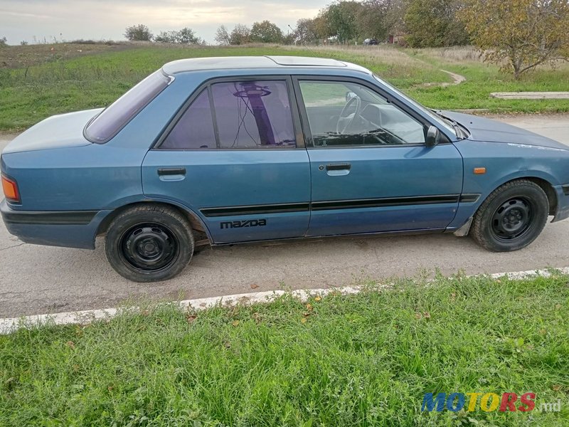 1990' Mazda 323 photo #5