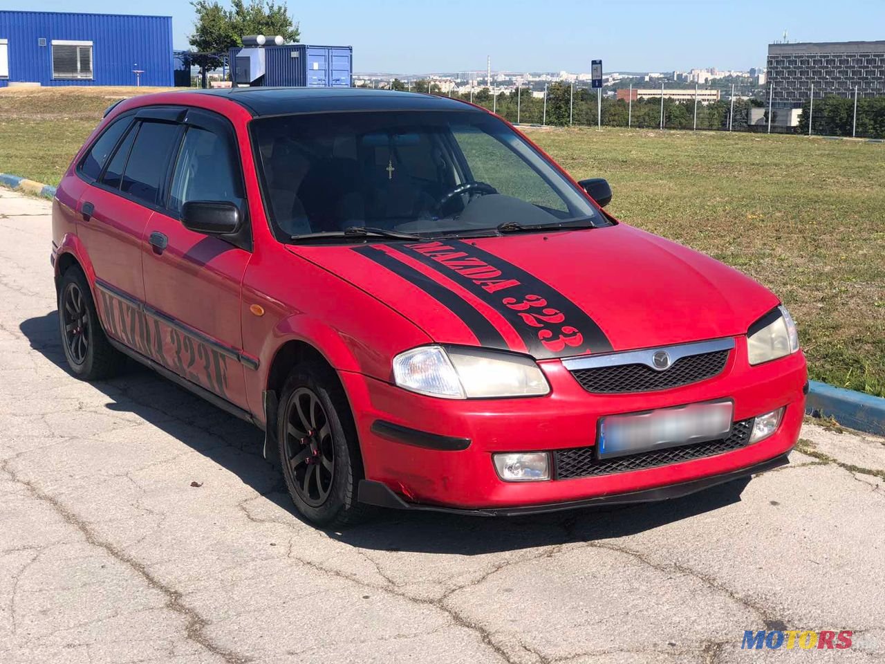 1998' Mazda 323 photo #1