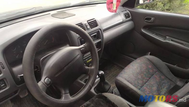 1997' Mazda 323 photo #5