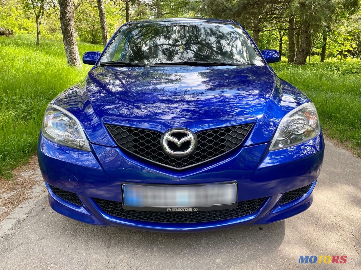 2004' Mazda 3 photo #5
