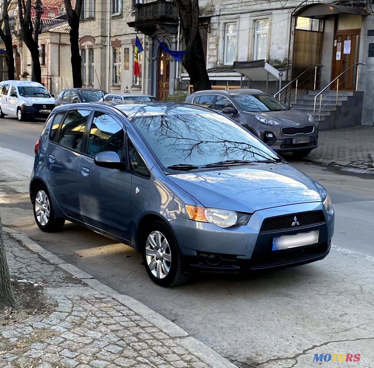 2009' Mitsubishi Colt photo #1