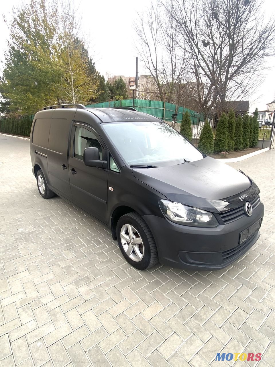 2015' Volkswagen Caddy photo #1