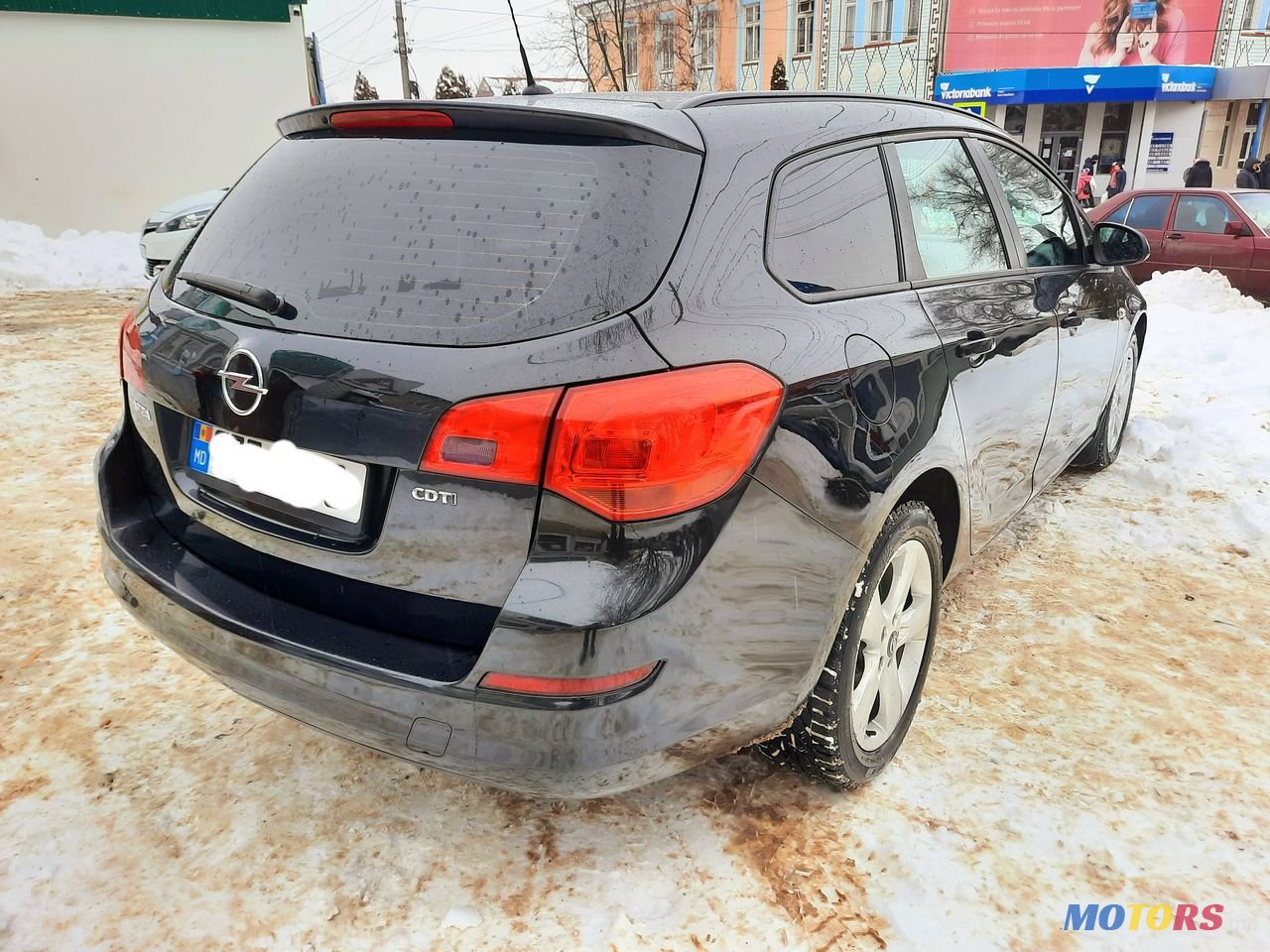 2011' Opel Astra photo #4