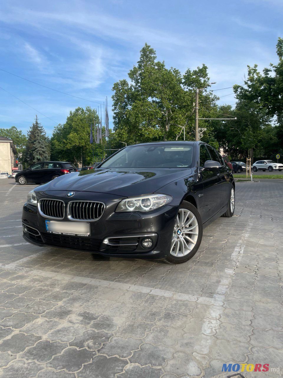 2014' BMW 5 Series photo #1