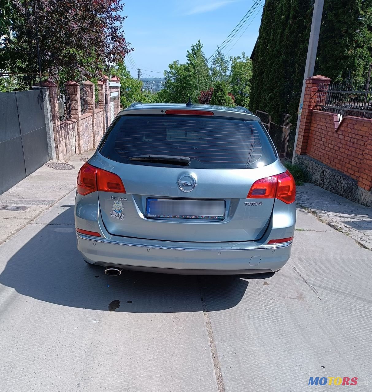 2013' Opel Astra photo #2