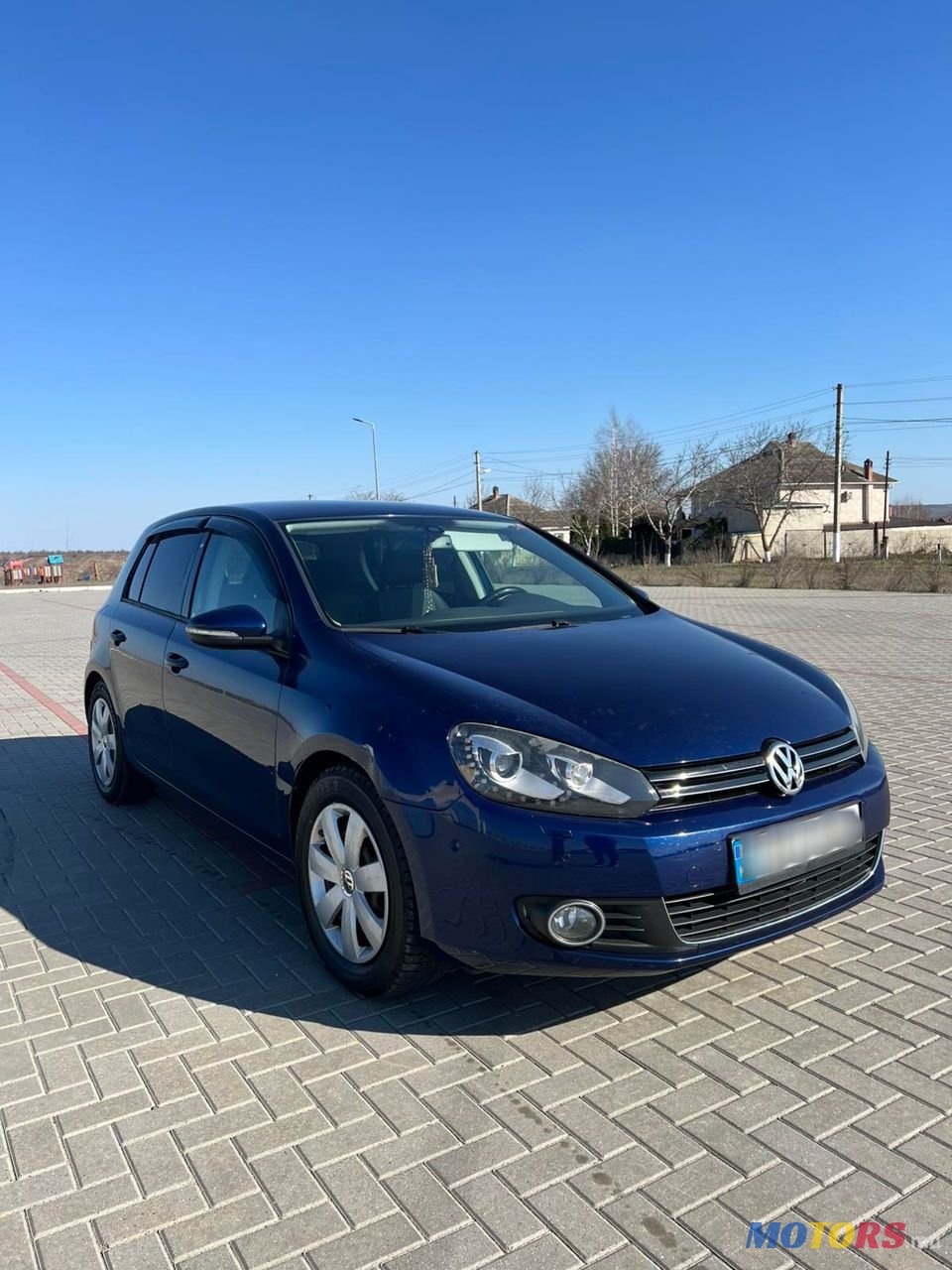 2011' Volkswagen Golf photo #1