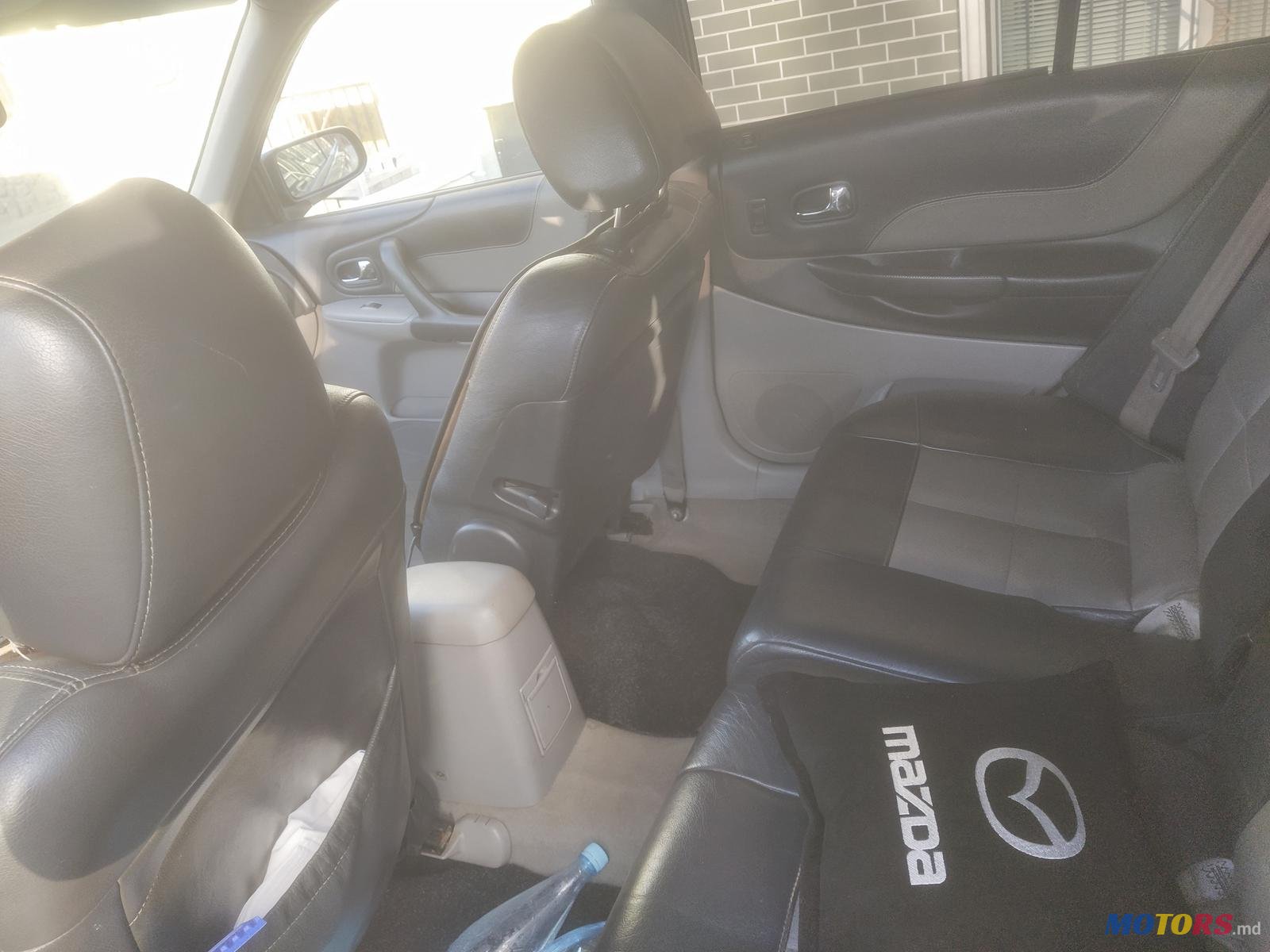 2001' Mazda 323 photo #5
