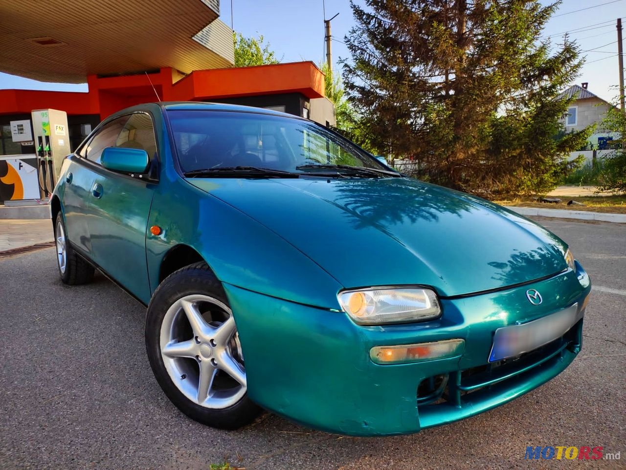 1998' Mazda 323 photo #1