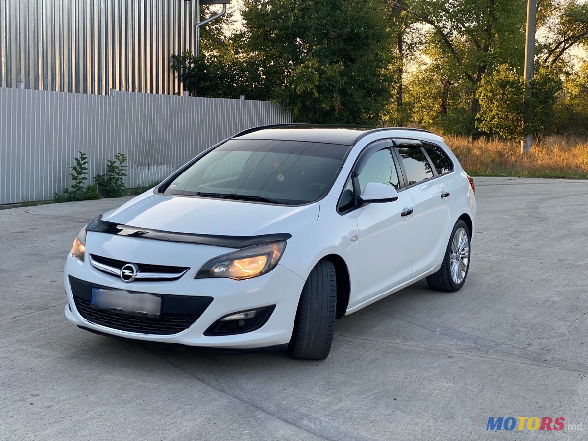 2014' Opel Astra photo #1