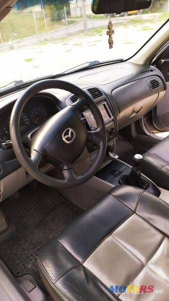 2001' Mazda 323 photo #2