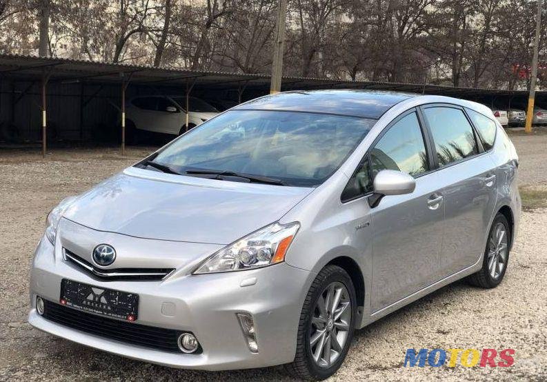 2013' Toyota Prius + photo #1