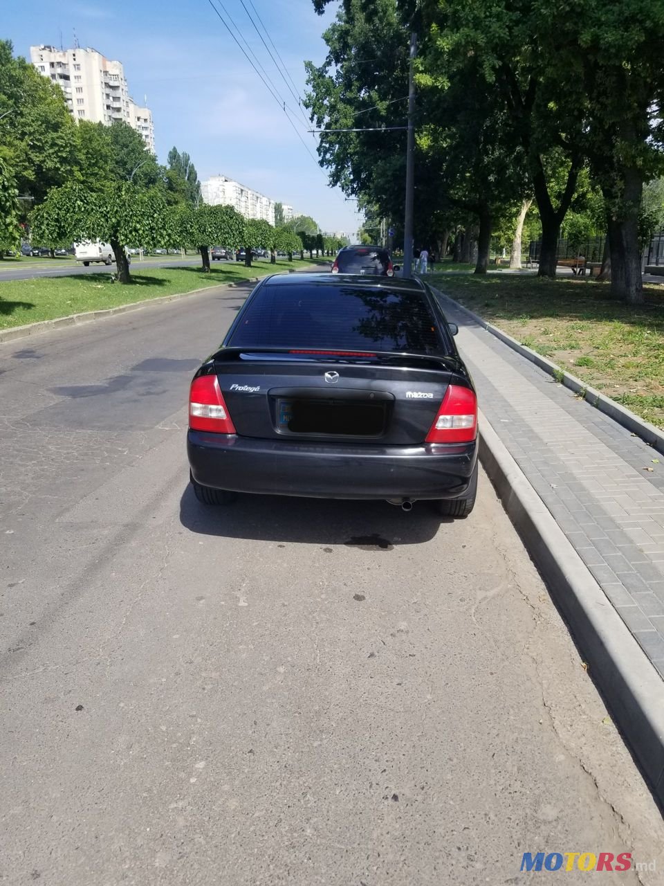 2002' Mazda 323 photo #5