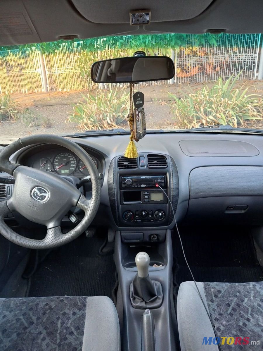 2000' Mazda 323 photo #5