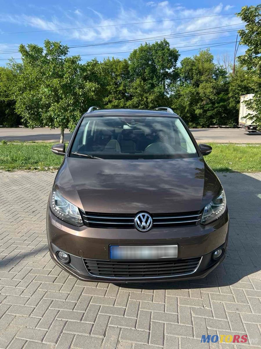 2012' Volkswagen Touran photo #1