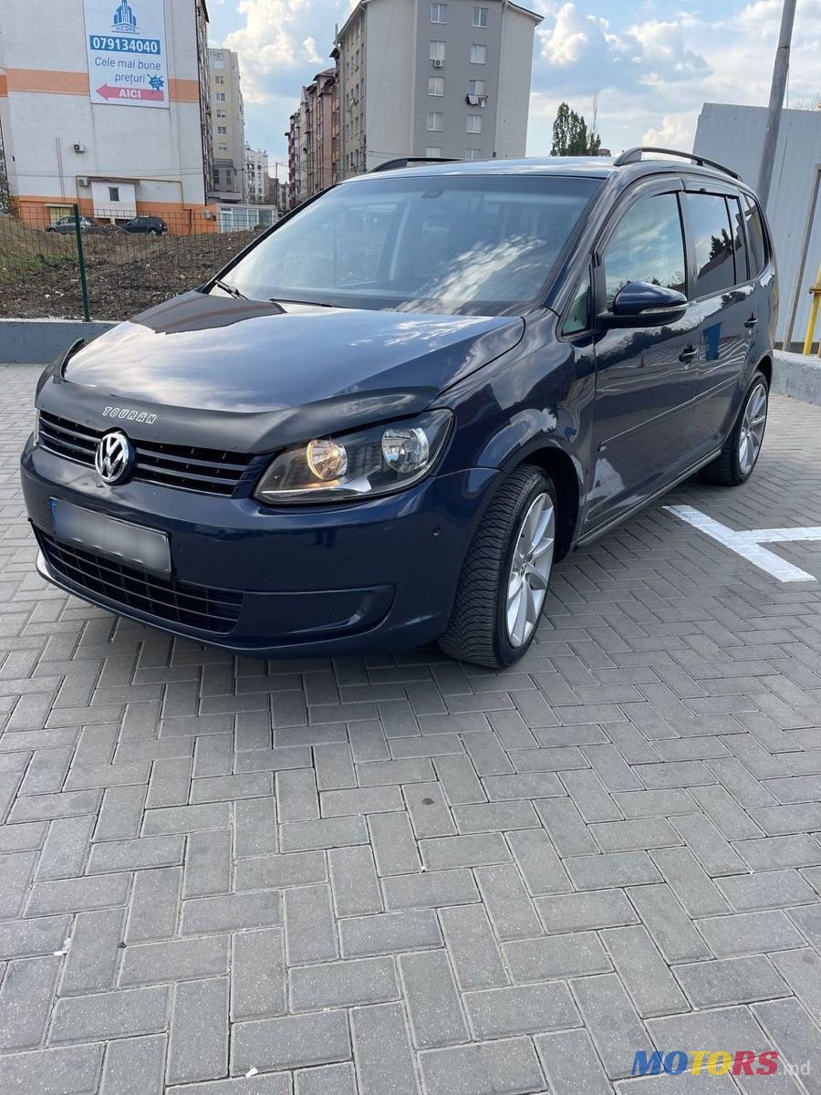 2013' Volkswagen Touran photo #1