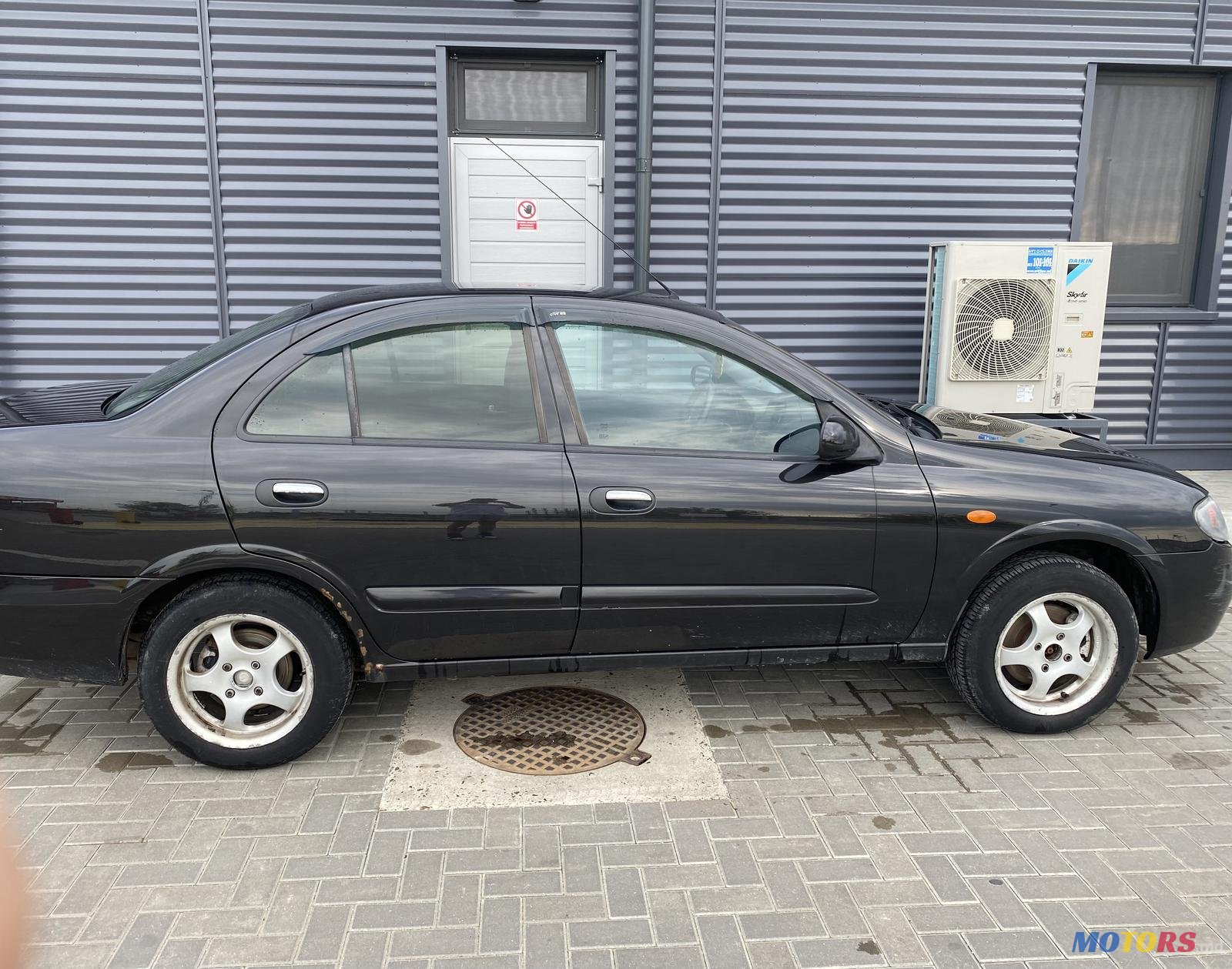 2005' Nissan Almera photo #3