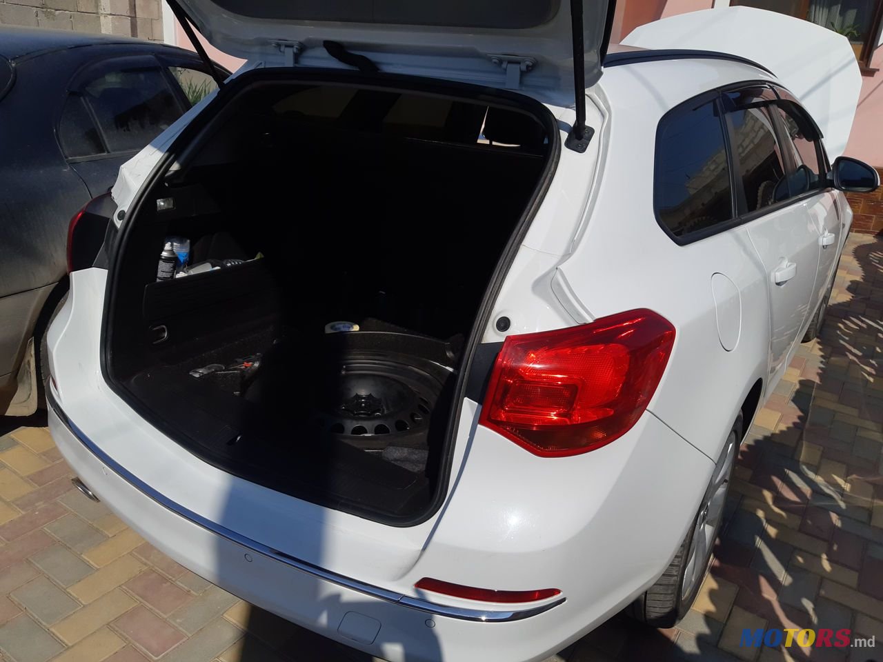 2014' Opel Astra photo #4