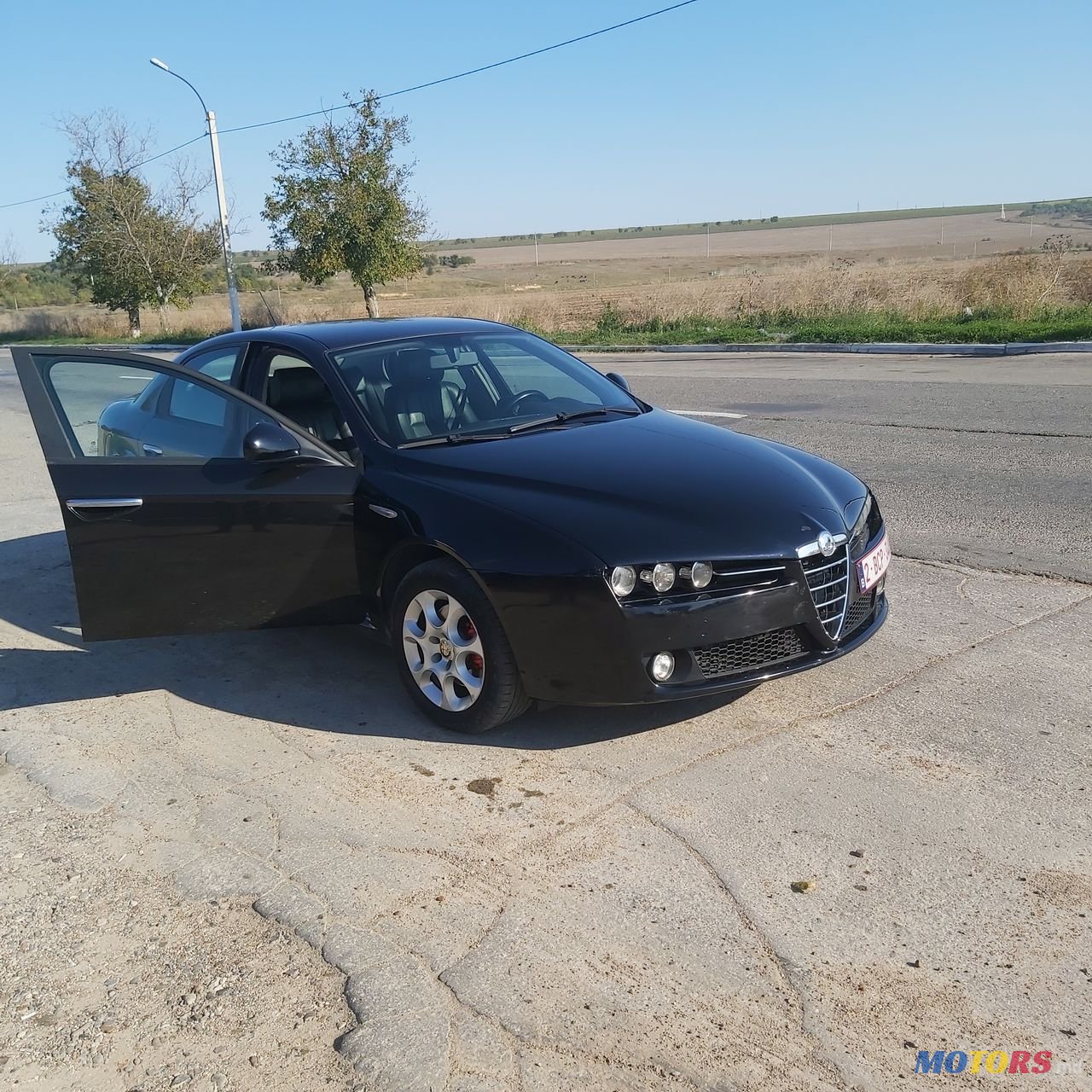 2006' Alfa Romeo 159 photo #1