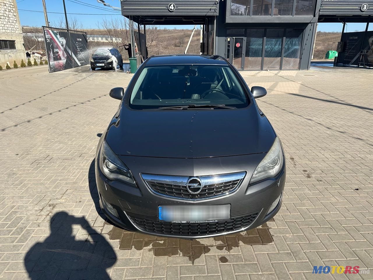 2012' Opel Astra photo #1