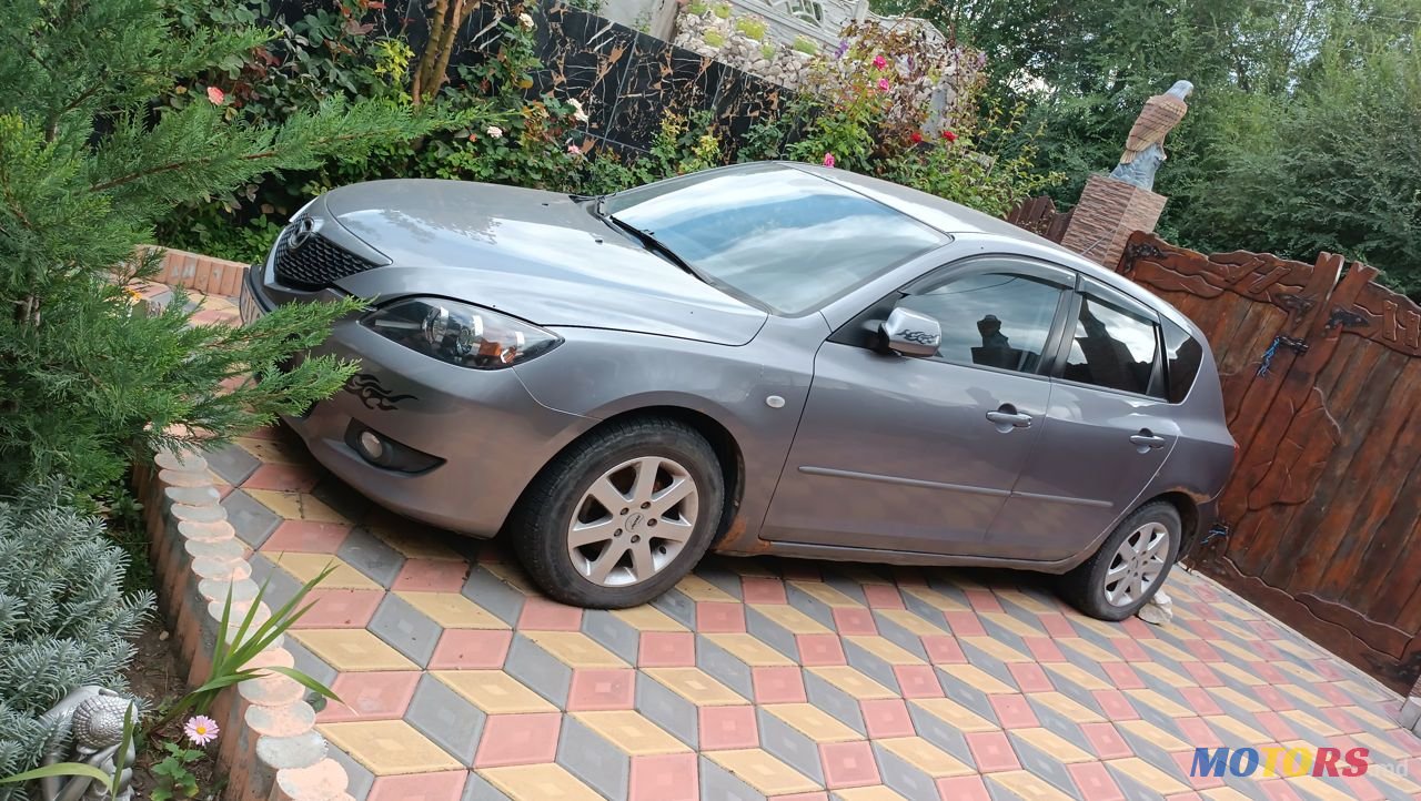 2005' Mazda 3 photo #1