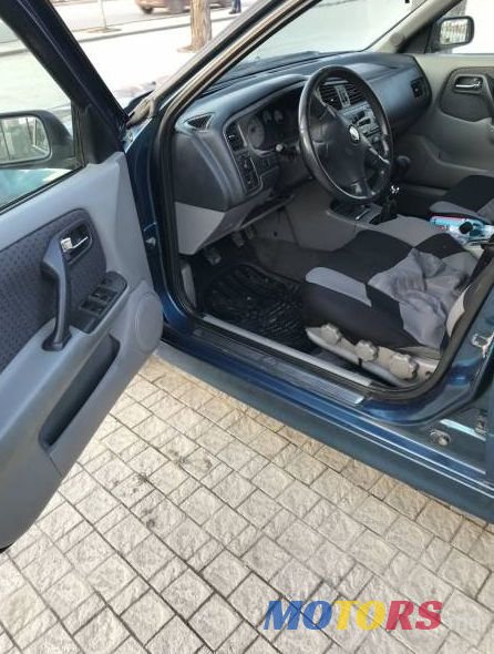 1999' Nissan Primera photo #2