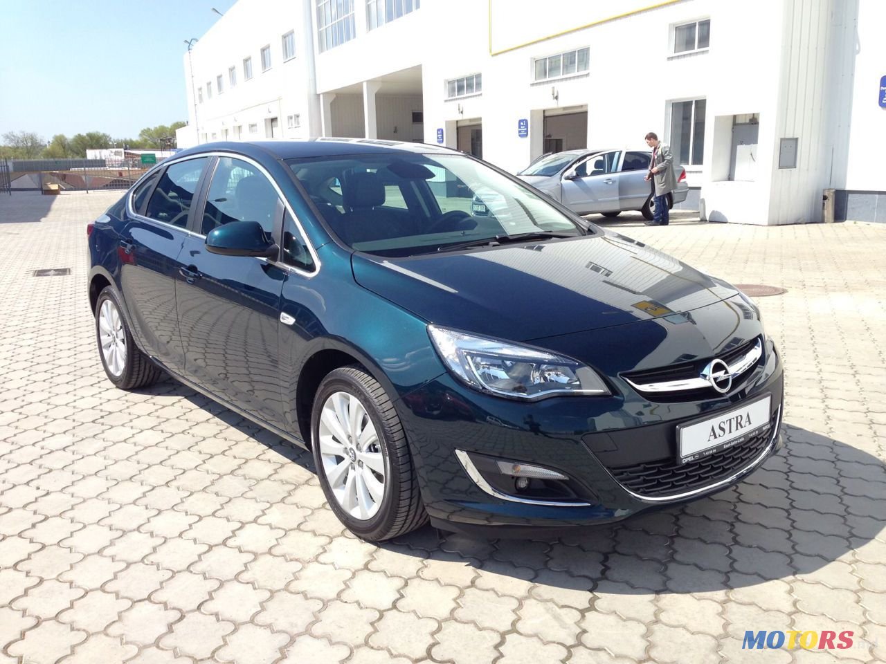 2014' Opel Astra photo #1