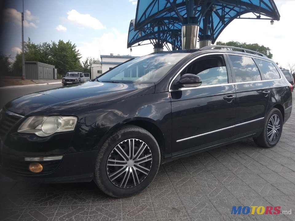 2009' Volkswagen Passat B6 Универсал photo #4