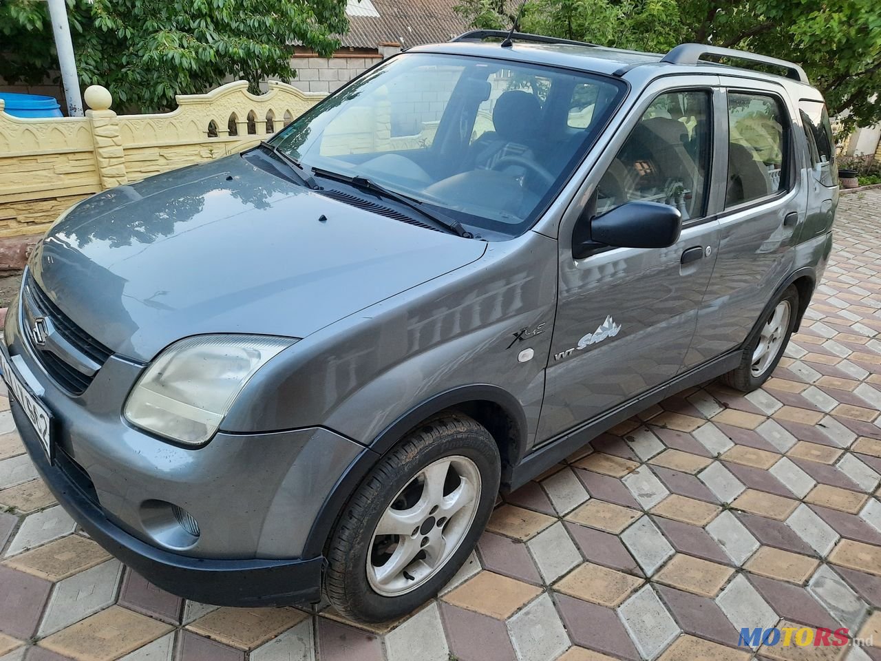2006' Suzuki Ignis photo #1