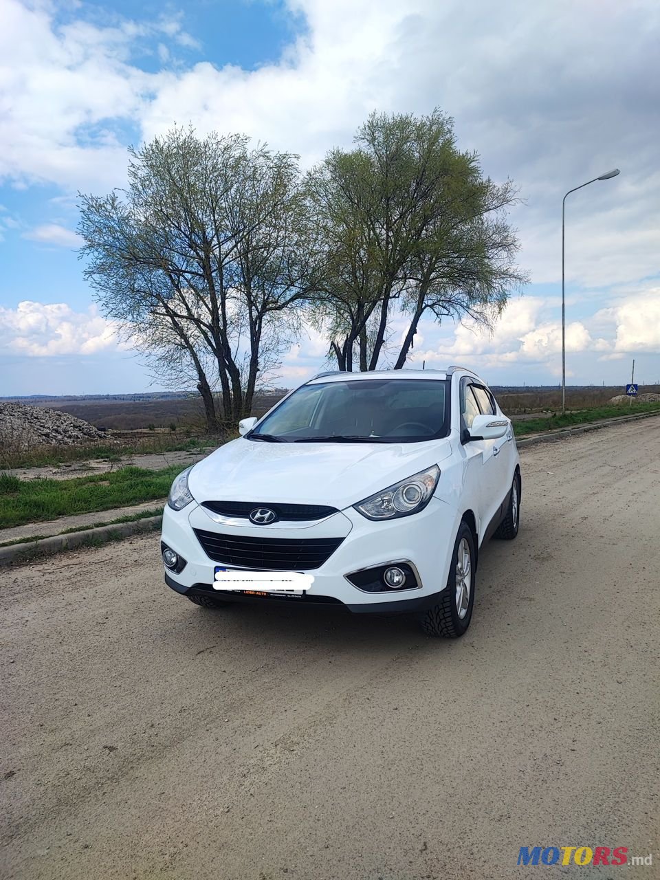 2011' Hyundai Tucson photo #1