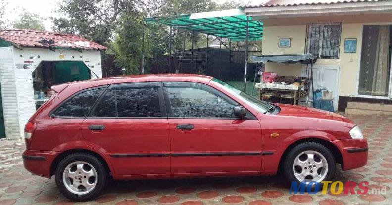 2000' Mazda 323 photo #3