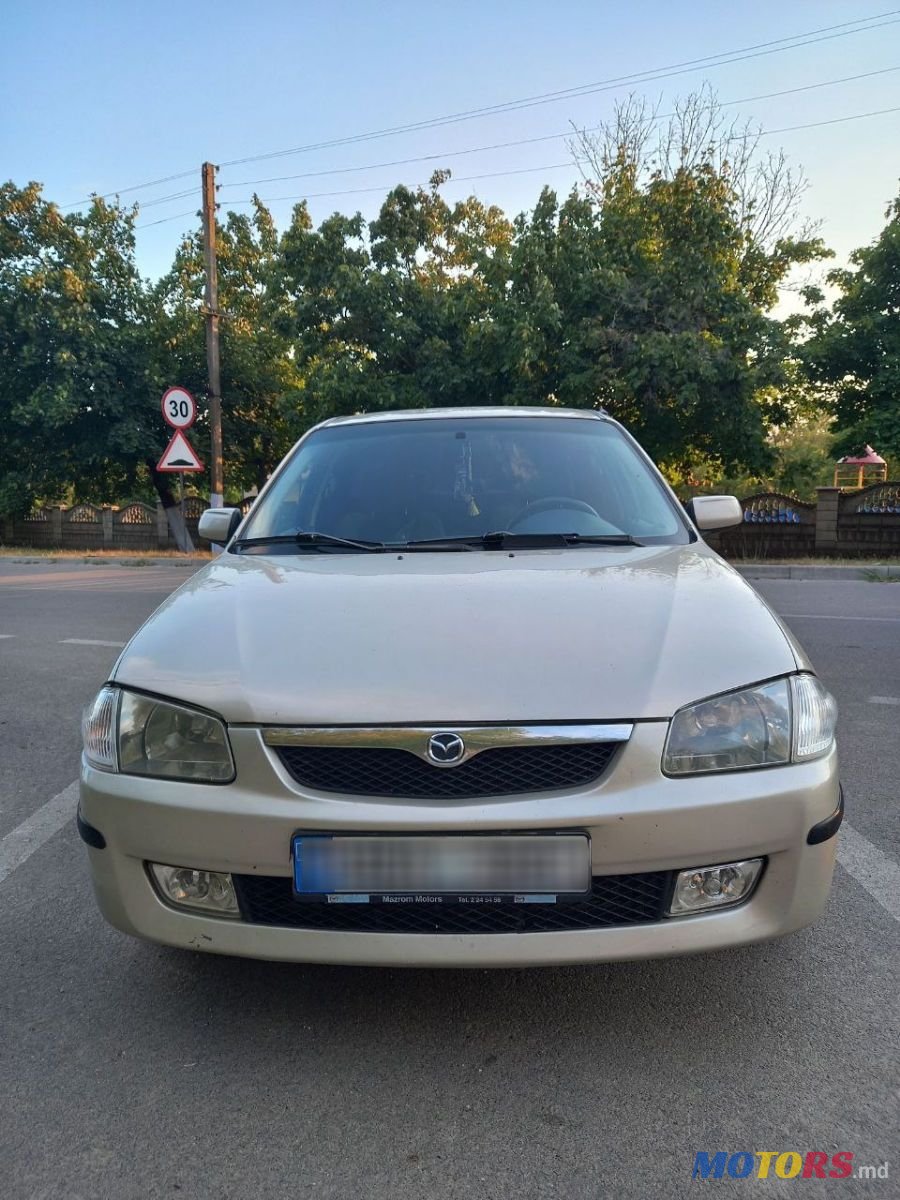 2000' Mazda 323 photo #1