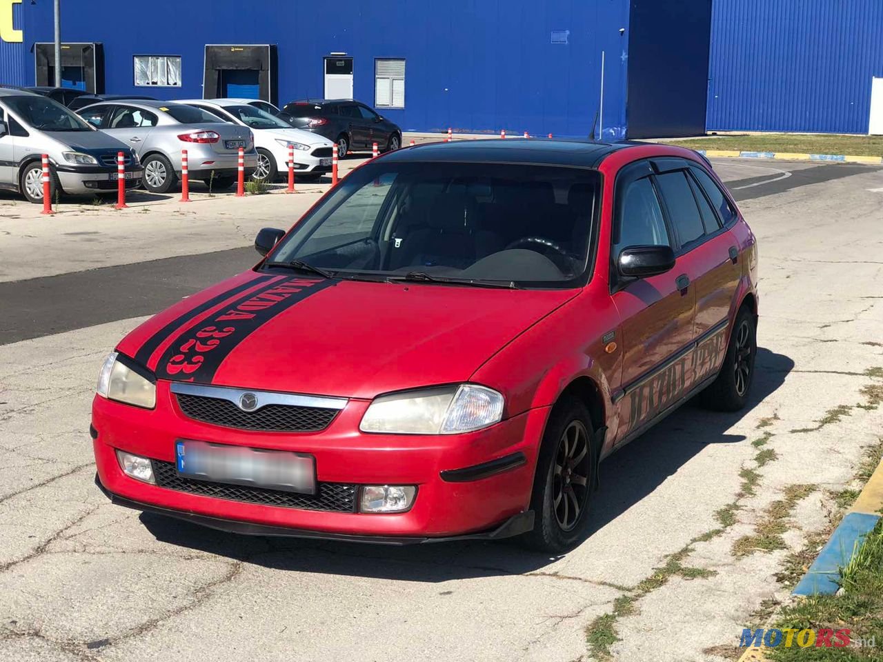 1998' Mazda 323 photo #2