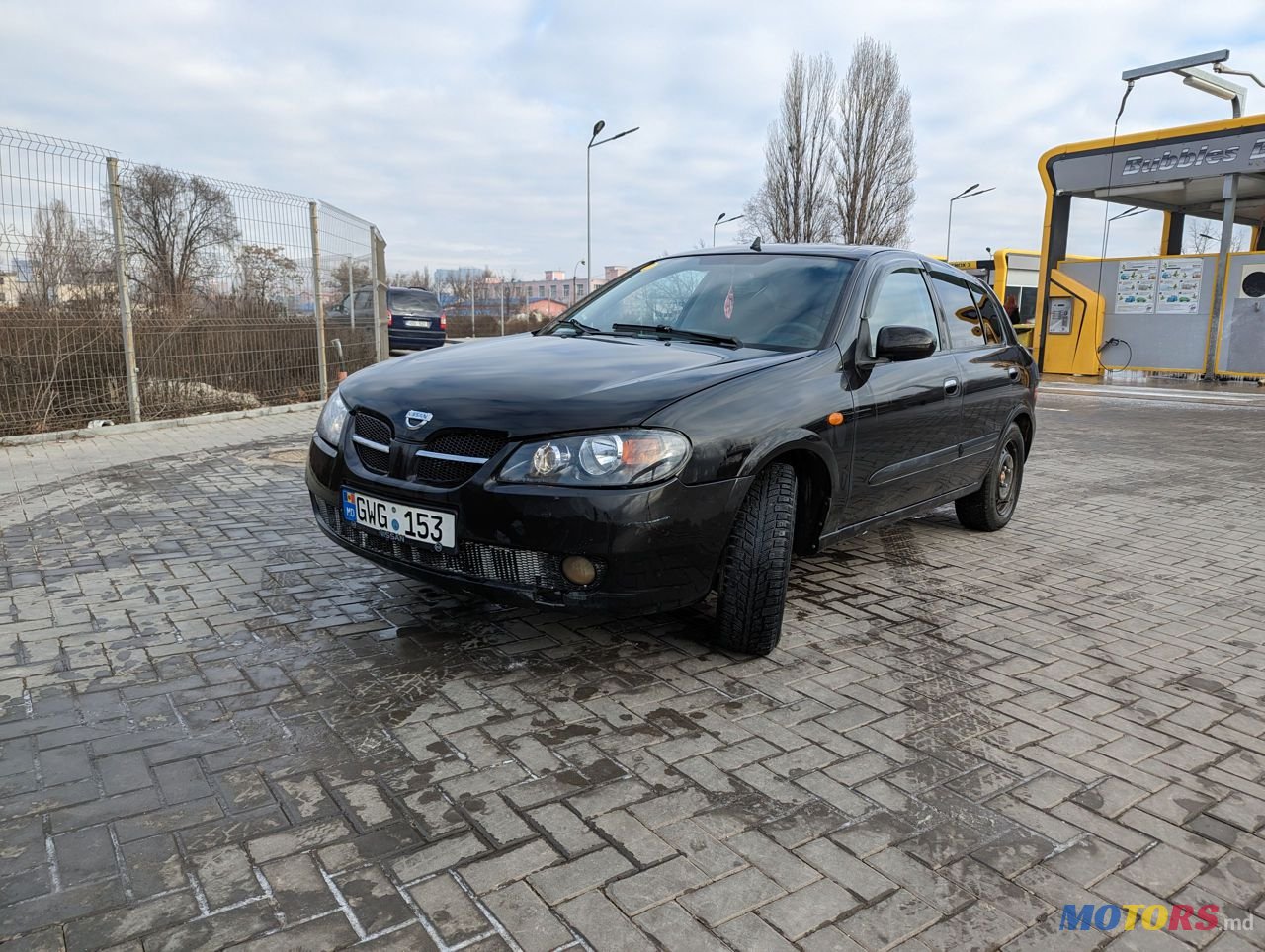2005' Nissan Almera photo #1