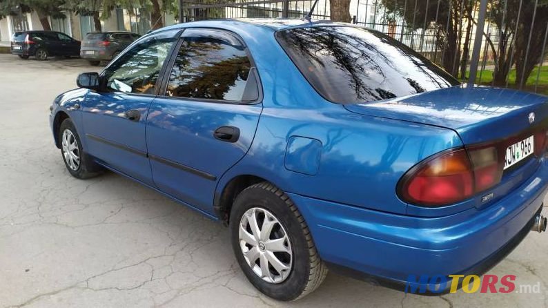 1997' Mazda 323 photo #1