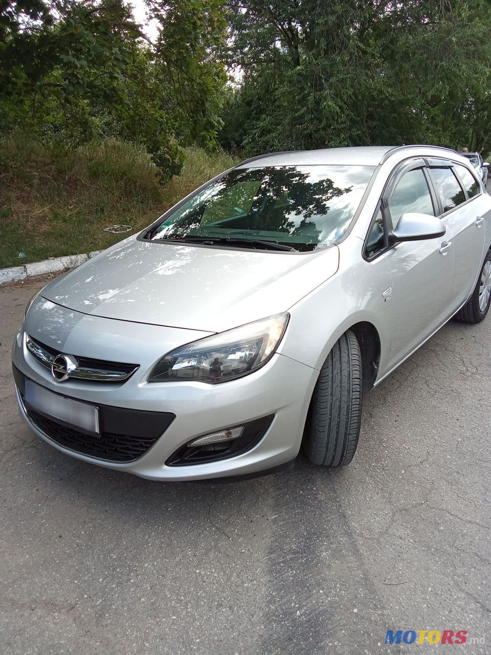 2014' Opel Astra photo #2