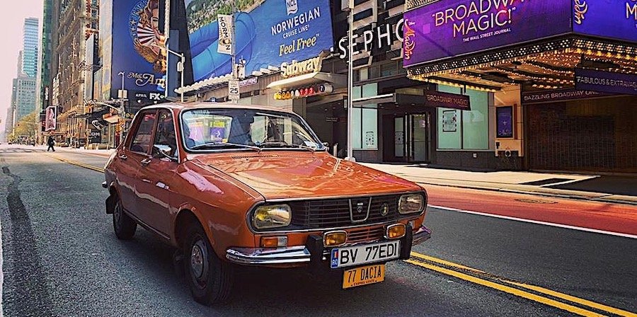 Strange Orange Car with Husky Inside Spotted on the Empty Streets of New York