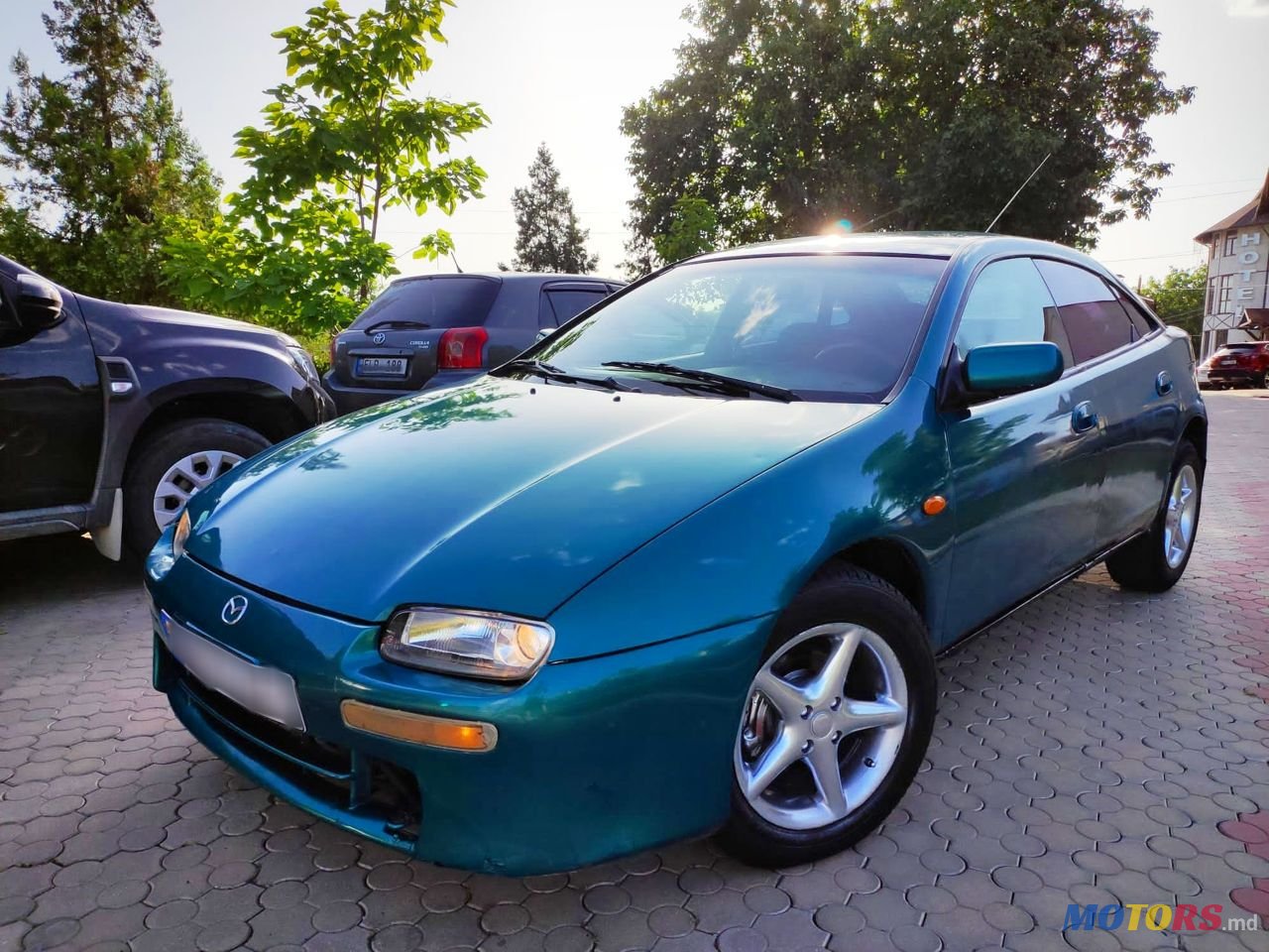 1998' Mazda 323 photo #5