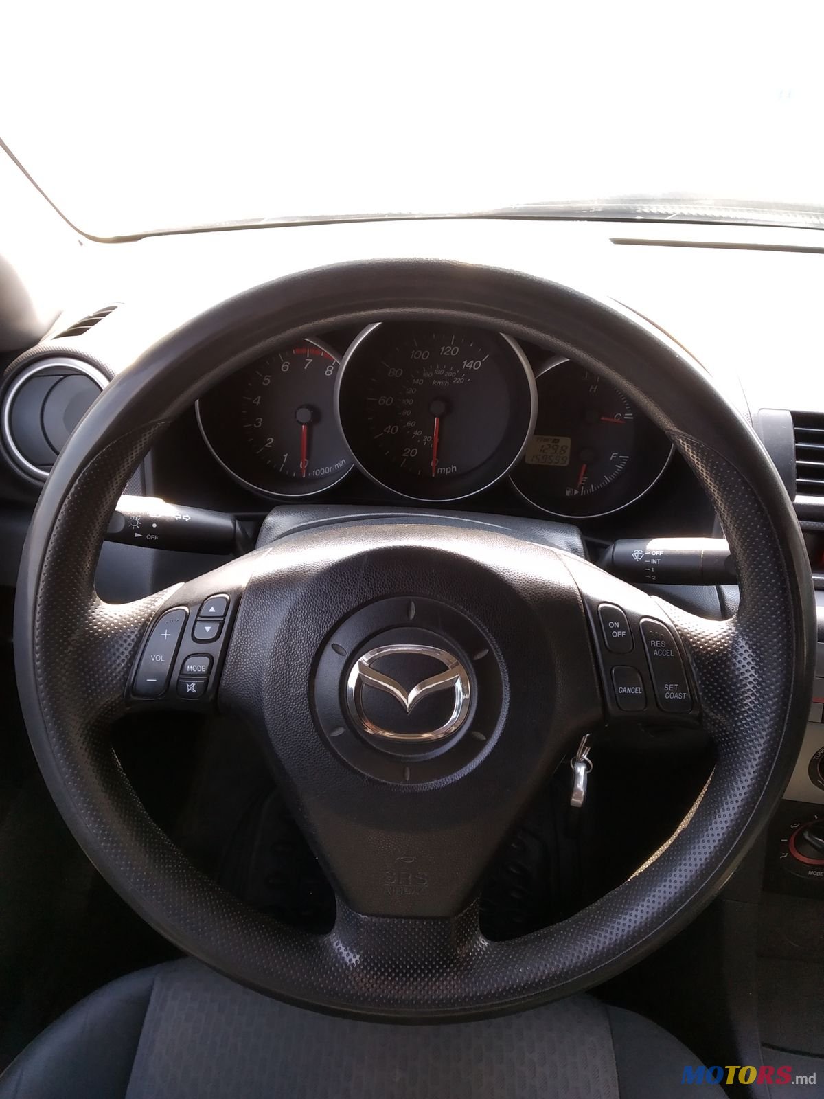 2004' Mazda 3 photo #1