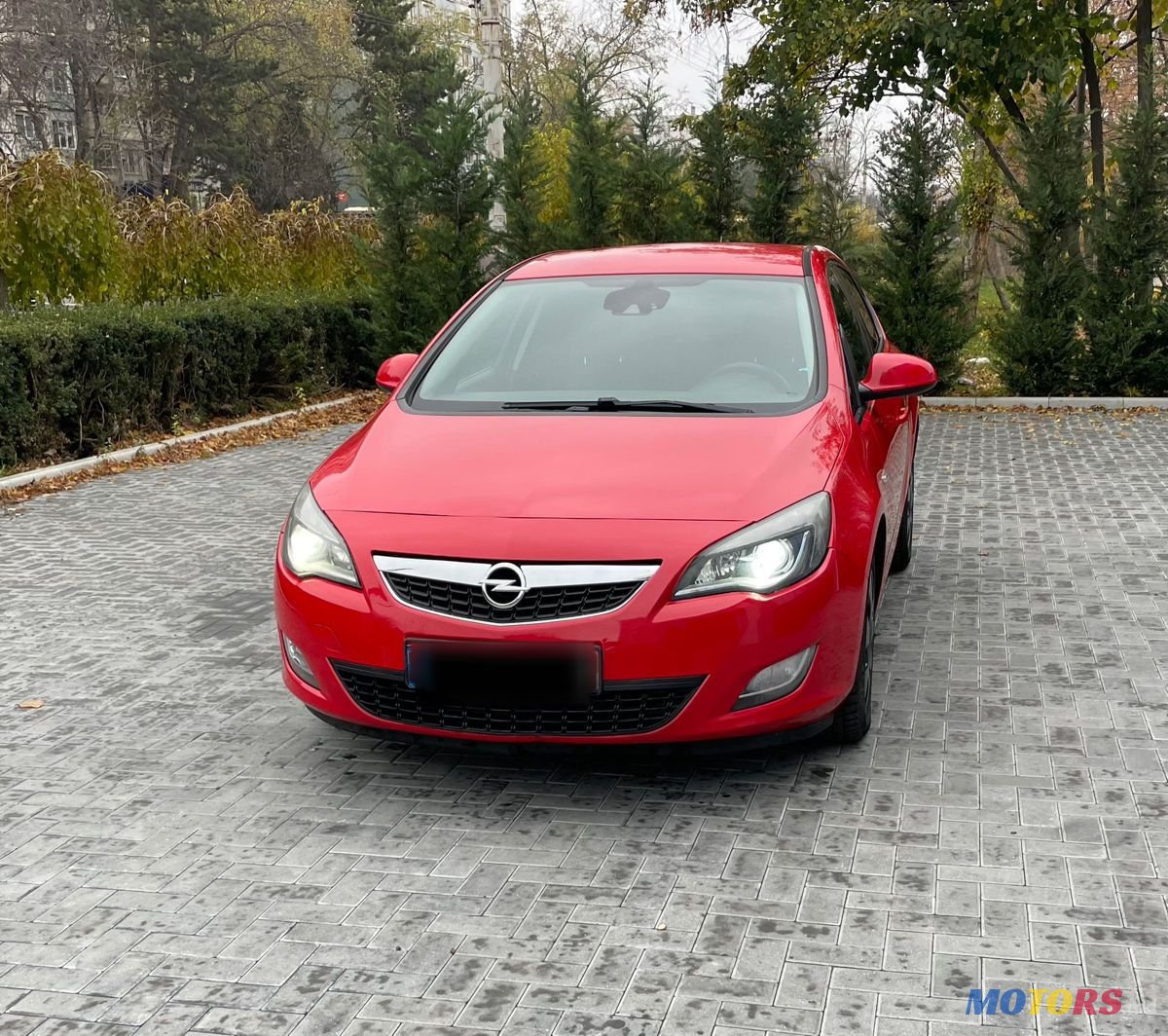 2012' Opel Astra photo #1