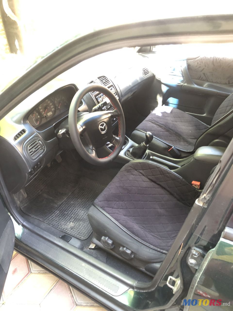 2000' Mazda 323 photo #6