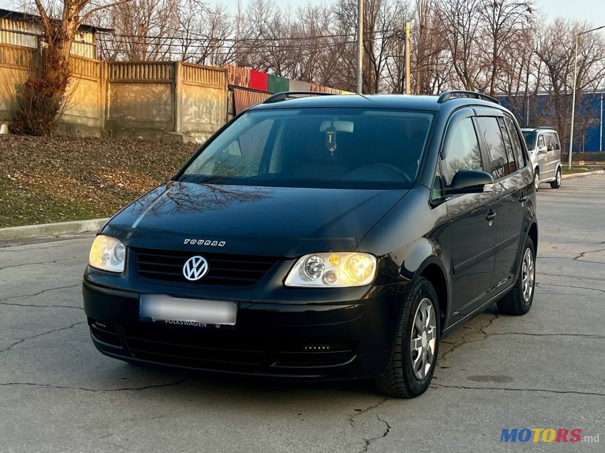 2004' Volkswagen Touran photo #1