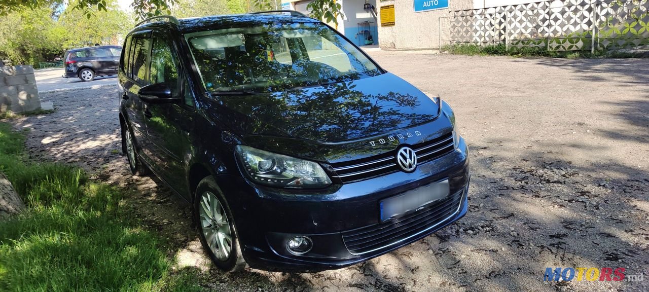 2013' Volkswagen Touran photo #1