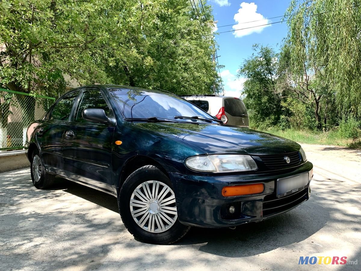 1994' Mazda 323 photo #1