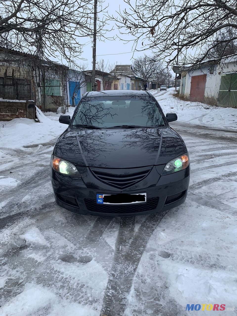 2007' Mazda 3 photo #1