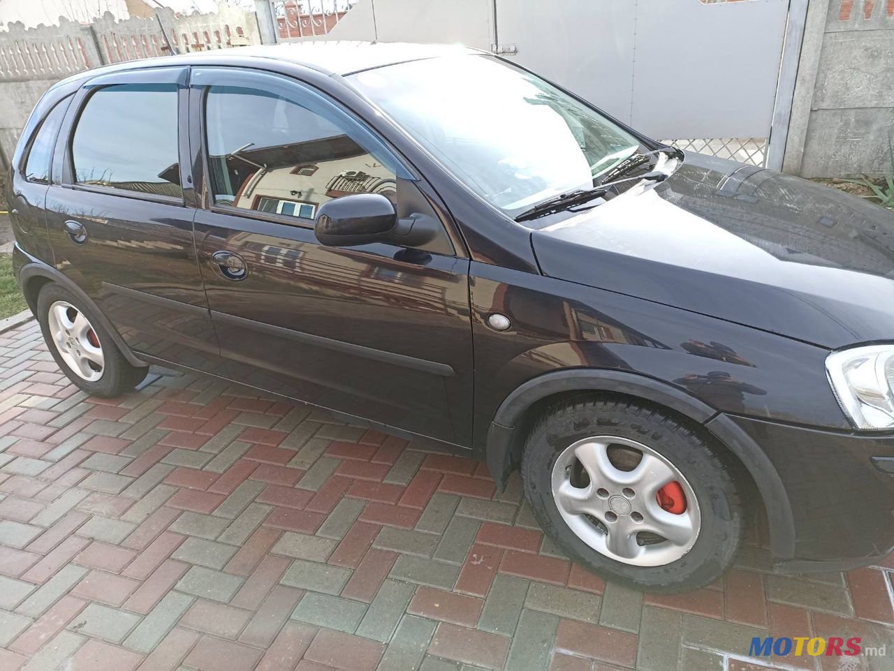 2004' Opel Corsa photo #1