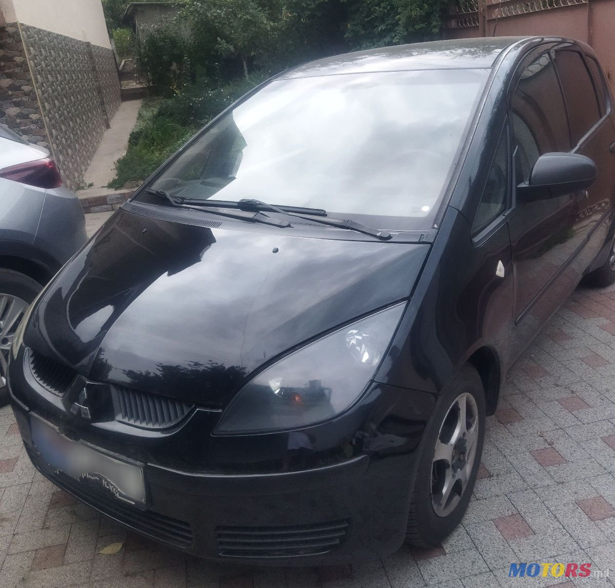 2005' Mitsubishi Colt photo #4