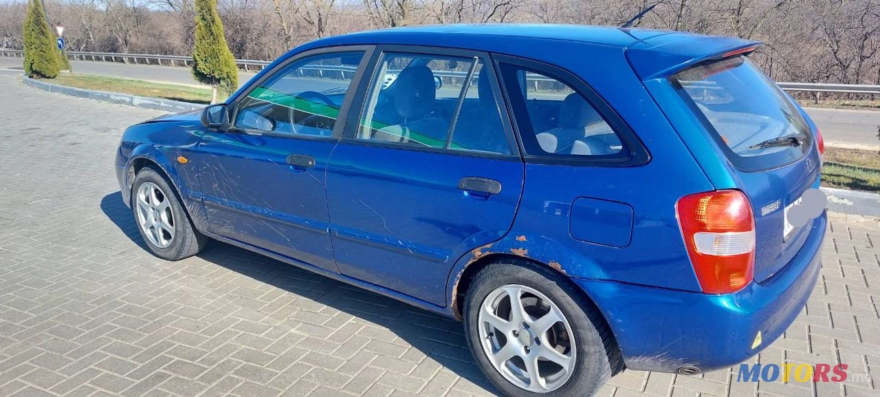 2001' Mazda 323 photo #6