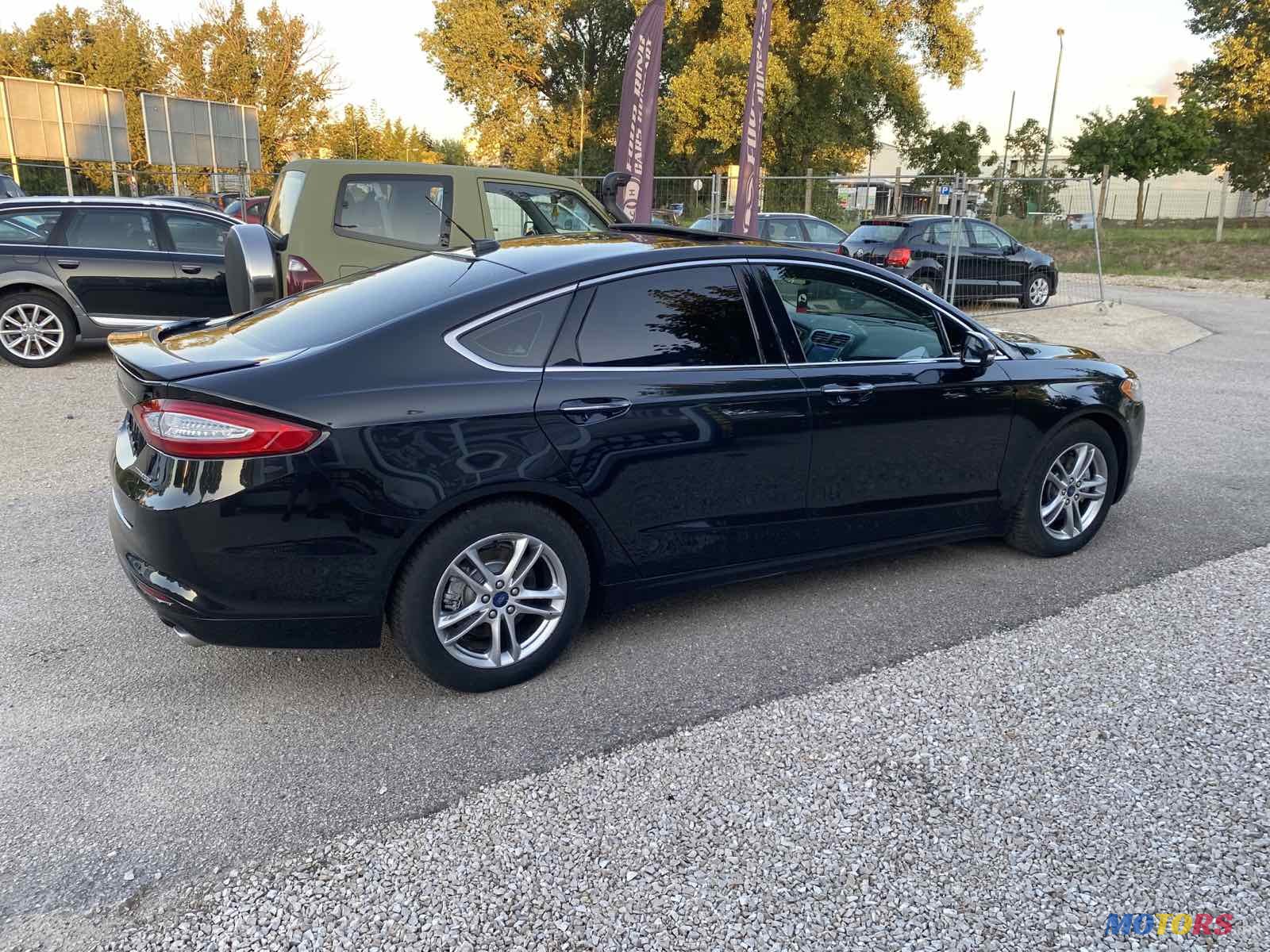 2014' Ford Fusion Energi titanium photo #4